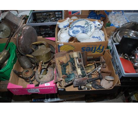 An old brass kettle, copper bowls, a surveyors level and china.