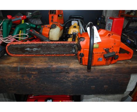 A Husqvarna chainsaw with 19" blade - good compression.