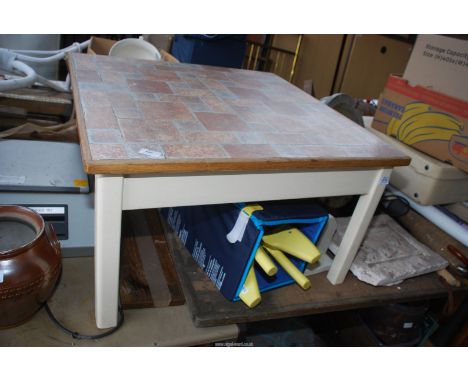 A tile topped table, 30" square x 17" high.