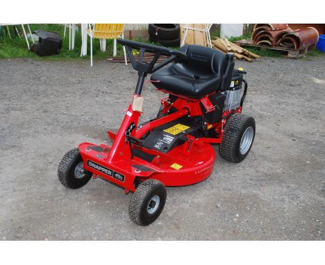 A Snapper ride on mower powered by a Briggs and Stratton engine - has had very little use.