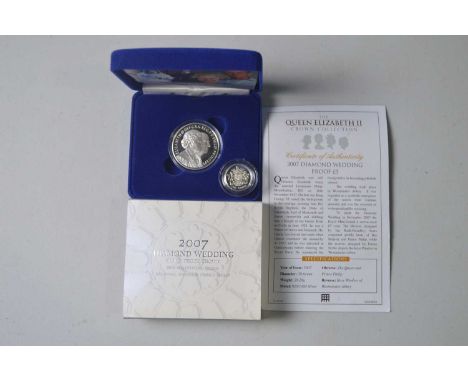 Queen Elizabeth II 2007 Diamond Wedding Silver Proof £5, with box and COA; 1983 Silver Proof £1. (2)