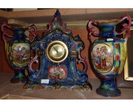 Ceramic clock with pair of matching vases with scenic panels depicting farming scenes