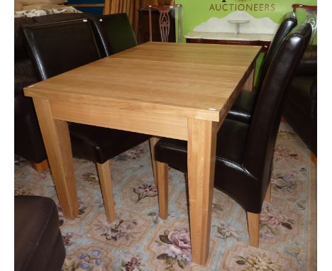 Light oak extending dining table and a set of 4 leather dining chairs