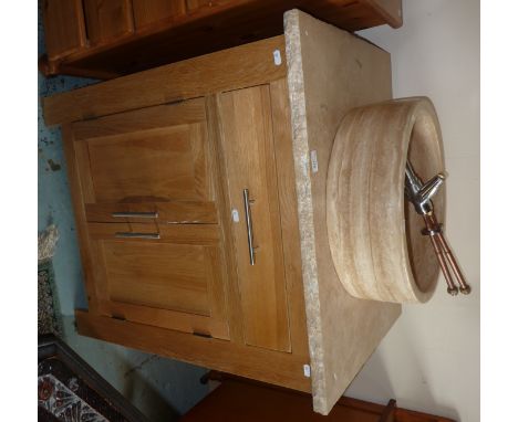 Modern light oak bathroom sink unit with marble basin