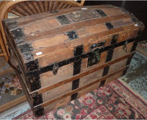 Wooden and metal dome top trunk