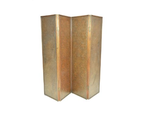 An outstanding walnut and lacquered paper three fold room screen by Liberty & Co, early 20th CenturyEach panel within a beade