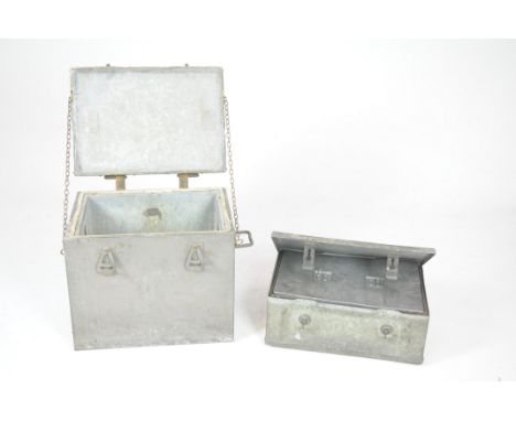 Two vintage military boxesThe first with hinged cover with plaque to top stamped 'Insulator, Swalls, 1939', revealing lead li