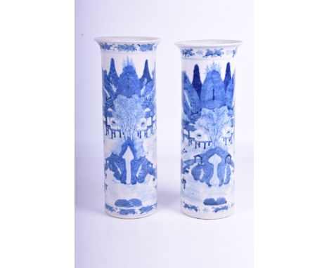 A pair of Chinese blue and white porcelain sleeve vases, Kangxi four-character marks, 19th century
Each of cylindrical form, 