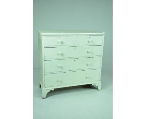 A Victorian painted pine chest of drawersThe rectangular moulded top above two short and three long drawers, raised on shaped