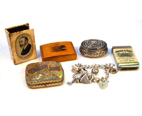 A collection of snuff boxes and vesta casesTo include; a Victorian silver oval embossed pill box, possibly Birmingham 1895, a