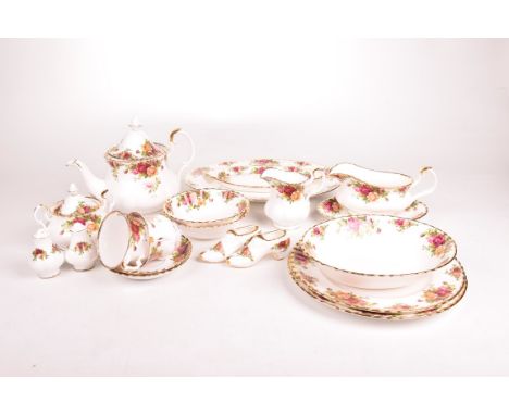 A Royal Albert 'Old Country Roses' dinner and tea serviceComprising 6 dinner plates, 7 bowls, 6 cups and saucers and side pla