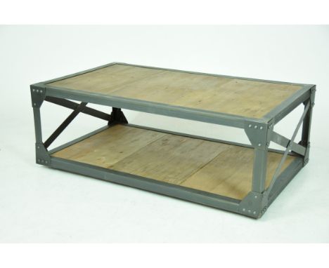 An Industrial type angle iron and hardwood centre tableWith a painted and riveted metal frame supporting a hardwood table top