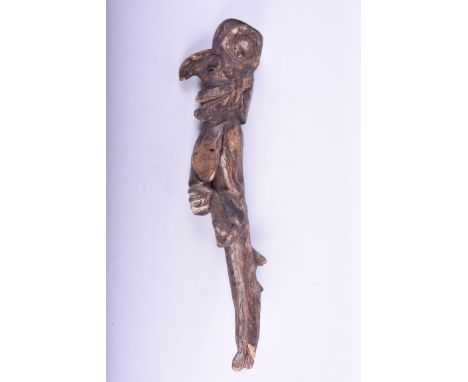 An Indonesian Javanese carved wood hand puppet
The gnarled piece of wood, carved in the form of a male figure, resembling pun