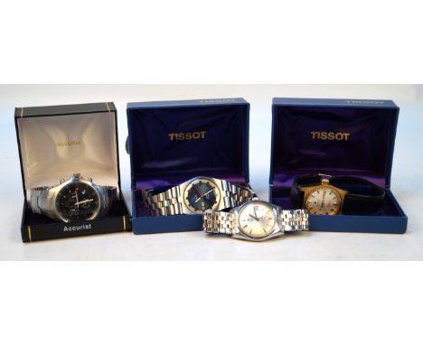Three Tissot watchesOf various designs, together with a Guess watch (4)