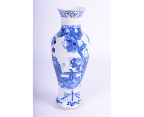 A Chinese blue and white porcelain vase, Kangxi four-character marks, 19th century
Of baluster form, rising from a splayed fo