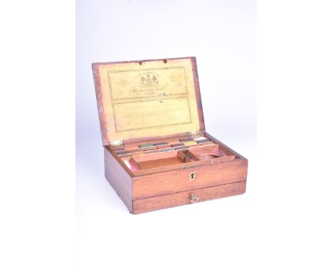 An early 19th Century mahogany artists box of paintsThe rectangular hinged lid with a paper label verso "G Blackman super fin