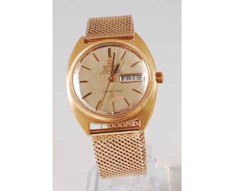 An Omega Constellation 18ct gold automatic gents chronometer, officially certified, having signed champagne dial with day/dat