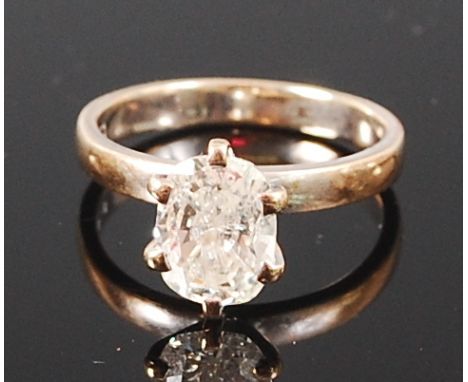 An 18ct white gold diamond solitaire ring, the oval cut claw set diamond weighing approx 1.6ct, we would assess colour as K/L