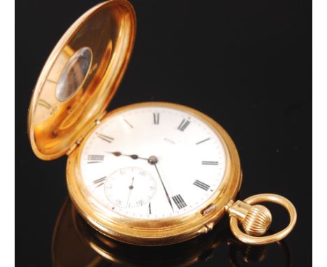 An 18ct gold cased gents half hunter pocket watch, the white enamel dial numbered 8576, having subsidiary seconds dial, keyle