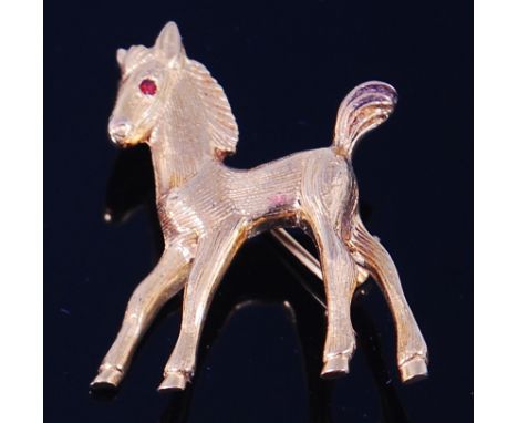 A modern 9ct gold brooch, modelled as a standing fawn, having small ruby set eye, 5.4g, 3.2cm