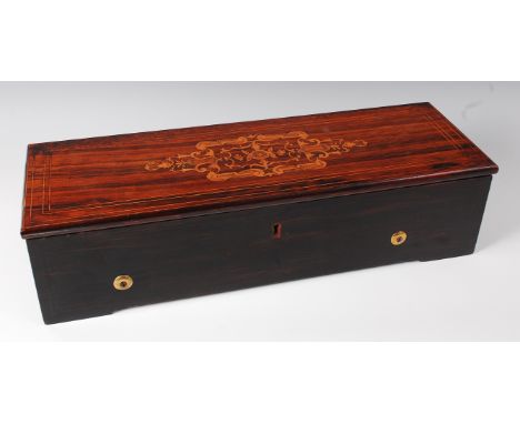 A late 19th century Swiss rosewood music box by Nicole Frères, the 13" cylinder playing eight airs, with printed songsheet st