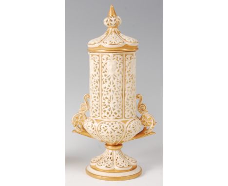 A Grainger & Co Royal Chinaworks Worcester pot pourri vase and cover, of ribbed reticulated form, with twin applied handles, 