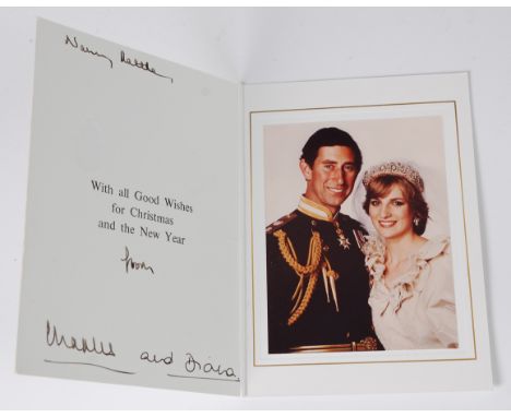 HRH Charles, Prince of Wales, and HRH Diana, Princess of Wales, Christmas greetings card, the cover with two embossed gold cr