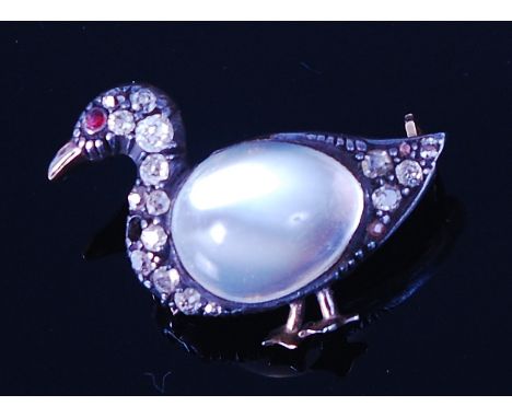 A Victorian 14ct moonstone and diamond set brooch, in the form of a duck, having further ruby set eye (one diamond missing), 
