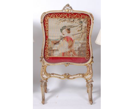 A mid-19th century French giltwood and gesso fire screen, having tapestry inset panel (with losses), h.99cm, w.53cm