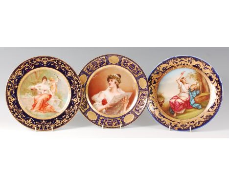 A late 19th century Vienna porcelain cabinet plate, depicting a maiden and Cupid within a classical garden, all within a coba