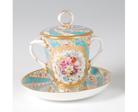 A Lynton Porcelain Co loving cup and cover on stand, polychrome enamel decorated with a reserve of wildflowers by Stefan Nowa