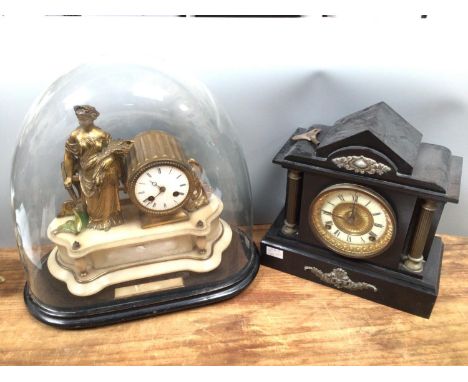 A French gilt ormolu figural clock, surmounted by a maiden with sheath of corn, white enamel dial with Roman numerals, raised