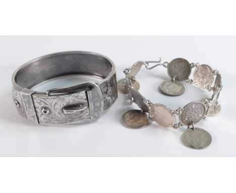 Silver pre-1947 threepenny bit bracelet, 24.1g and a Silver belt buckle bangle, 26.4. (2) 