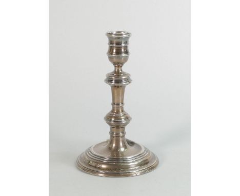 Silver candlestick, base filled, gross 282g. 