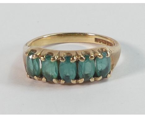 9ct gold ring set with five green stones,size K/L, 2.9g. 