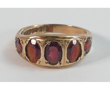 9ct gold ring set with 5 brown stones,size K, 3g. 