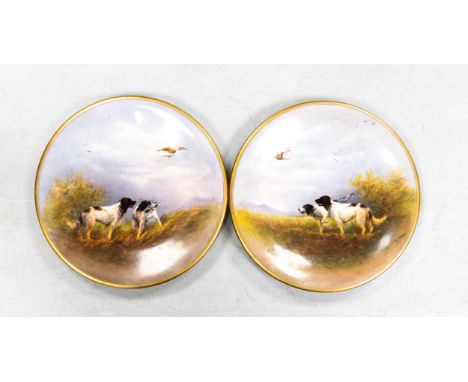 Two Crown Devon hand painted plates with gun dogs, signed R Hinton. Diameter 24.5cm, pattern 0929 (2) 