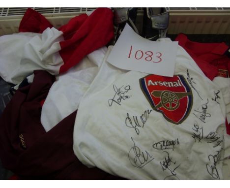 A collection of 18 football shirts, all collected by a previous Tottenham/Arsenal employee. The collection includes 10 multi-