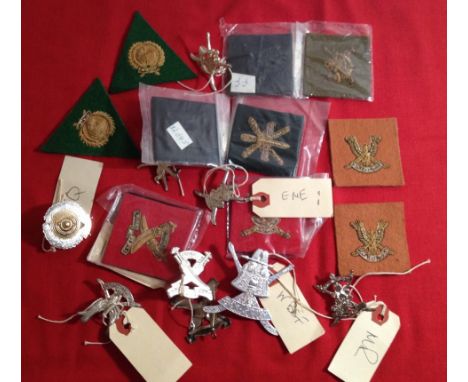Sultan of Oman Land Forces badges. Comprising 21 metal and cloth & bullion badges. Collected by the late Major M.E. Roythorne