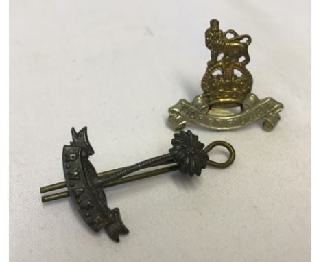 2 WWII military cap badges. The Royal West African Frontier Force badge together with Royal Army Pay Corps. 