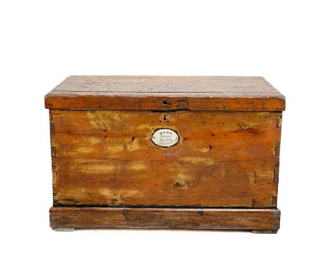 A pine travel trunk. Late 19th century, with a zinc lined interior, later fitted a Kent oval pottery plaque, height 64cm, wid