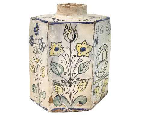 A 17th century hexagonal Haban faience tea cannister. Painted with tulips and other flowers, Masonic symbols, and dated 1663,