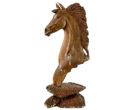 A wood carved horse head sculpture. Naturalistically carved with flowing mane on a adze carved base, height 80cm.