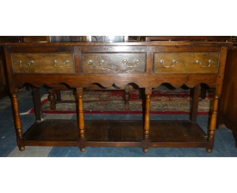 A Reproduction Three Plank Oak Dresser Base with Pot Board Stretcher Shelf and Turned Supports, 152.5cm Wide 