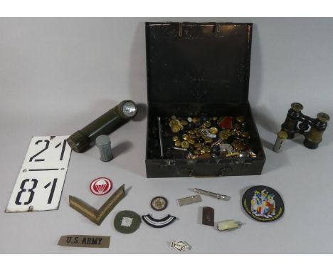 A 1945 Military First Aid Tin Containing Various Military Badges, Buttons, Medals, Binoculars, Torch etc 