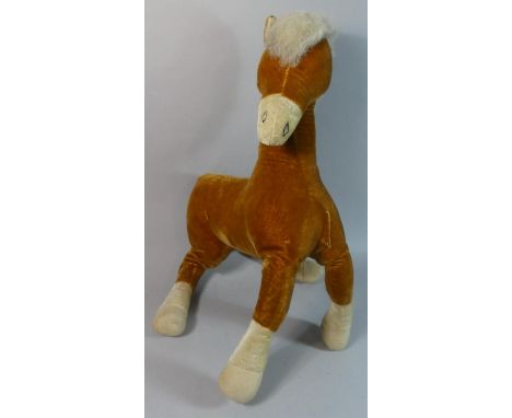 A Vintage Merrythought Horse, One Ear Missing 