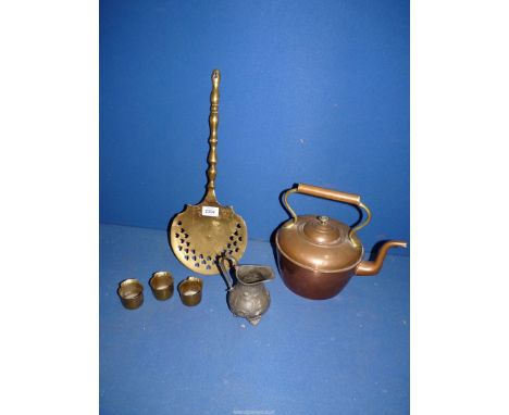 A small quantity of metals including; a copper kettle, pewter jug, brass numbered cups, brass roaster, etc.