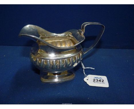 A Dutch Silver cream Jug having a lion rampant in shield and letter 'A' stamped to base, maker E&amp;R, possibly 1835, 276g.