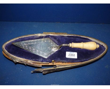 A boxed Silver presentation Trowel, Birmingham 1884, with bone handle inscribed to front 'The Trowel Was Used By His Excellen