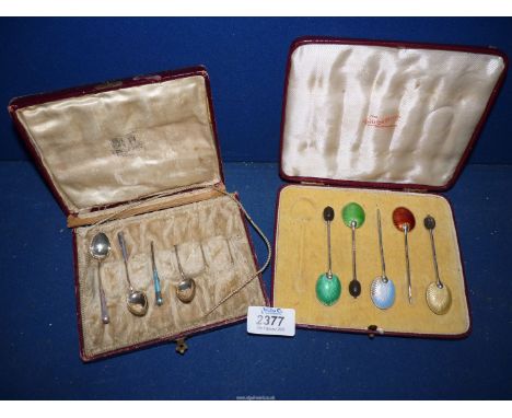 A cased part set of five Silver coffee bean Spoons with coloured enamel to the back of the bowls, stamped Birmingham 1940 (so